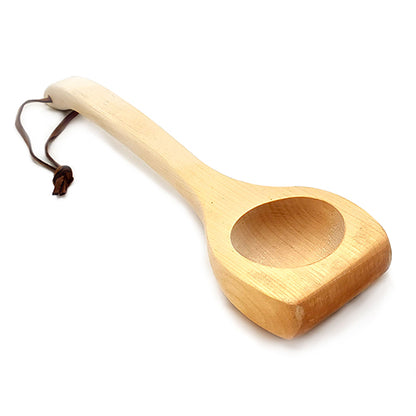 Wooden ladle on a white background