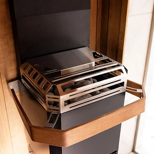 Saunum heater in a sauna with wood heater protector